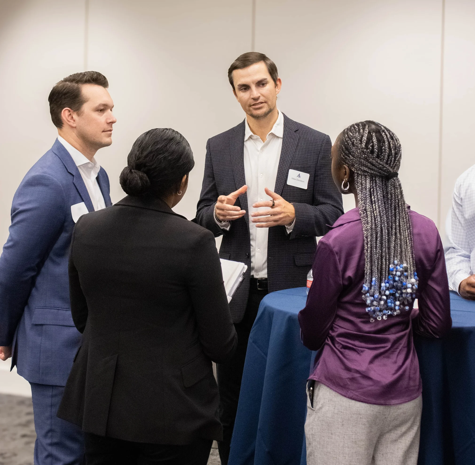 Two Rice students speaking with employers at a CCD event